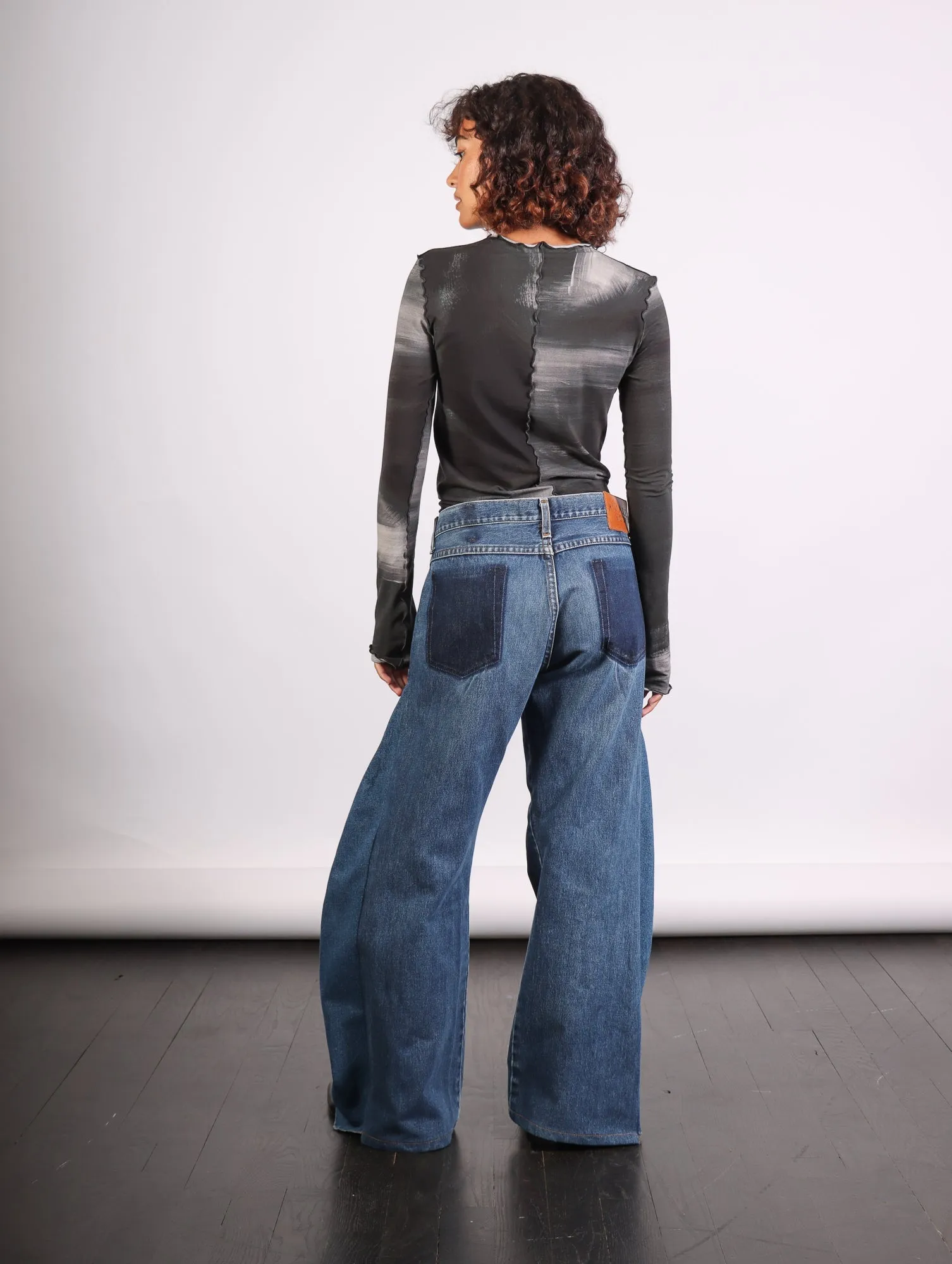 A.W.A.K.E. Mode Upcycled Horseshoe Jeans in Blue by A.W.A.K.E. Mode